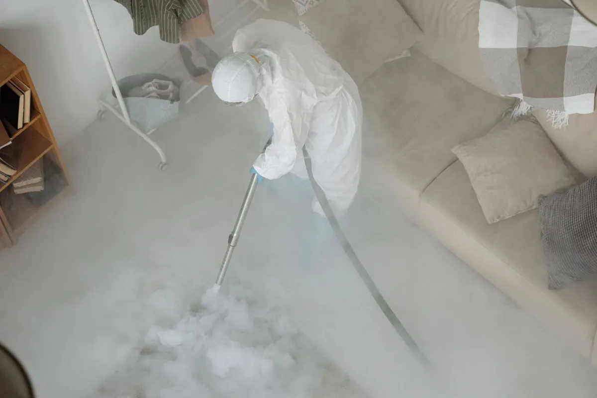 Biohazard cleanup technician in protective equipment, Emporia, VA
